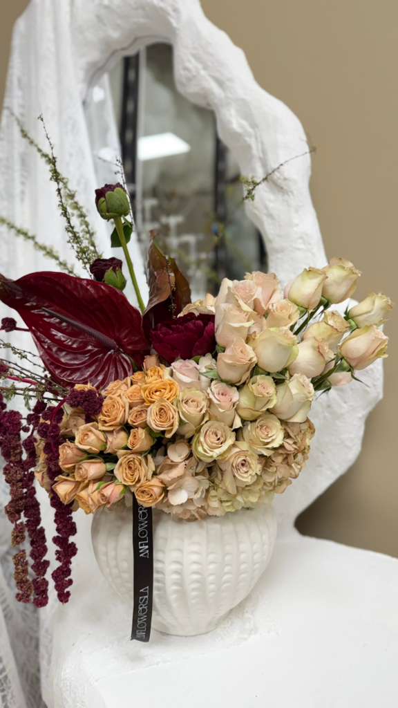 Roses with flamingo flower — view 1