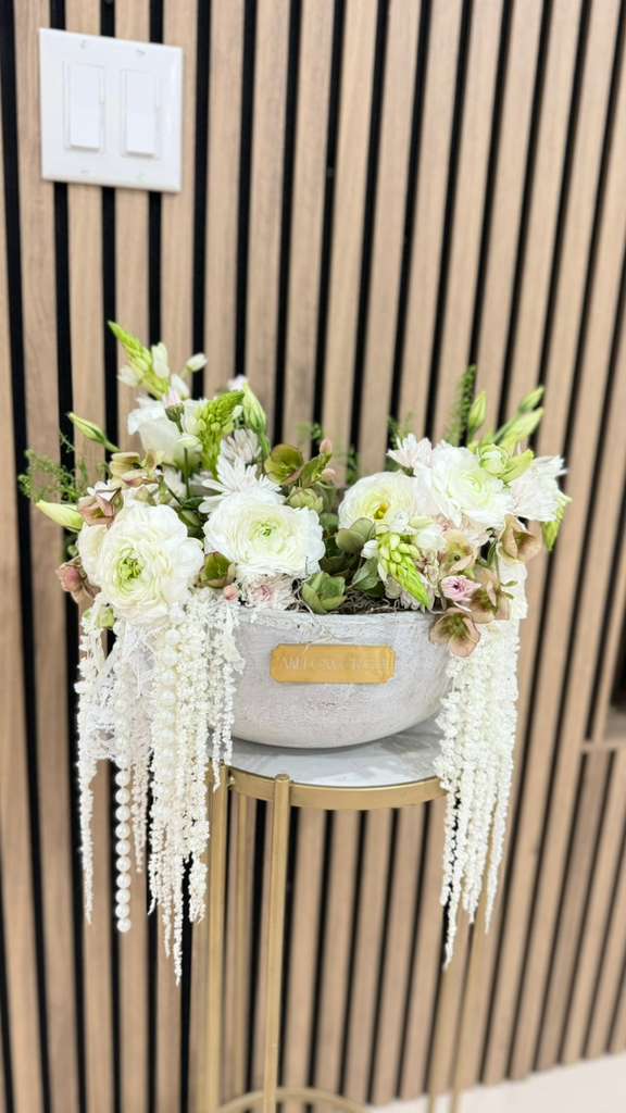 Elegant white & green floral arrangement with ranunculus and lisianthus — view 1